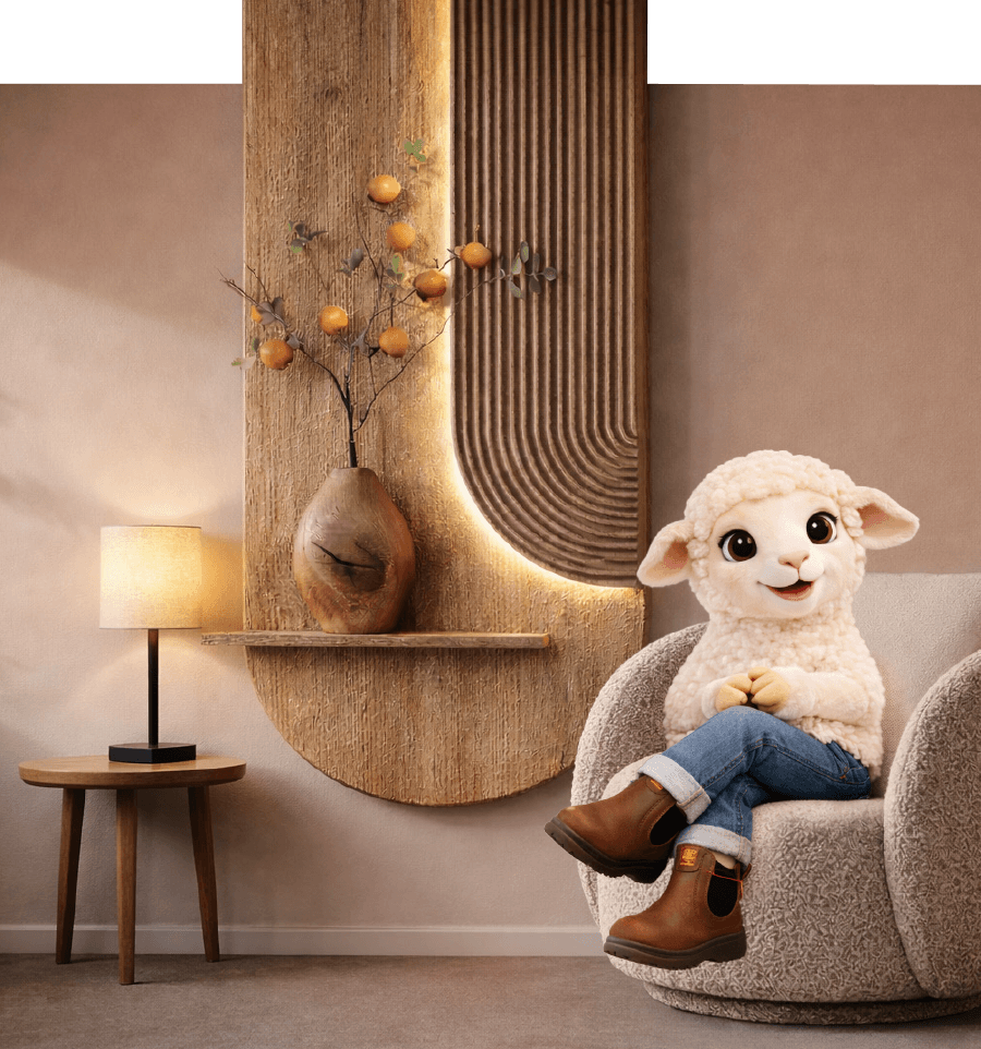 כבשה יושבת עם כורסא